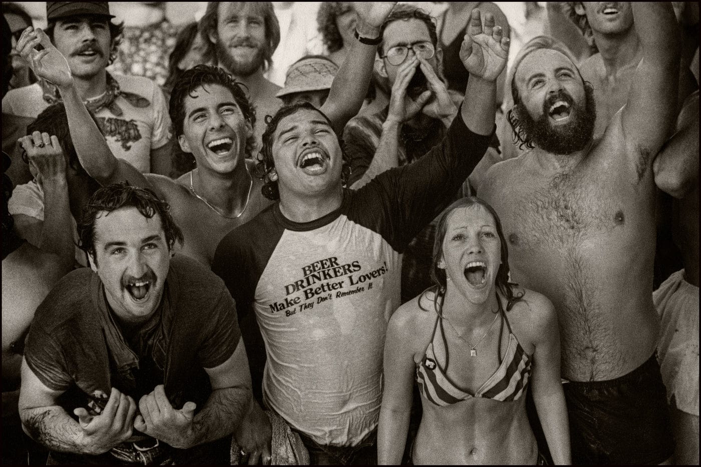 The MF Gallery Concert Goers Pleading to be Showered with a Water Hose, 1982 Photograph