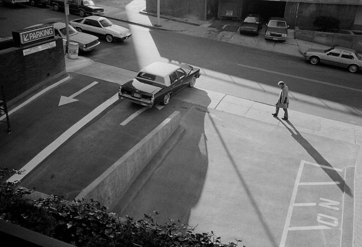 Crane Kalman Brighton Man Walking Past Parking Lot Photograph